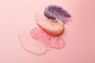 Photo of Samples of cosmetic products on pink background. Skin care