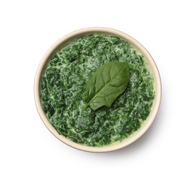 Delicious spinach sauce in bowl isolated on white, top view