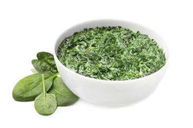 Photo of Delicious spinach sauce in bowl and leaves isolated on white