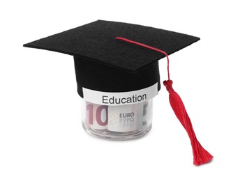 Photo of Graduate hat and euro banknotes in glass jar with word Education isolated on white. Tuition payment