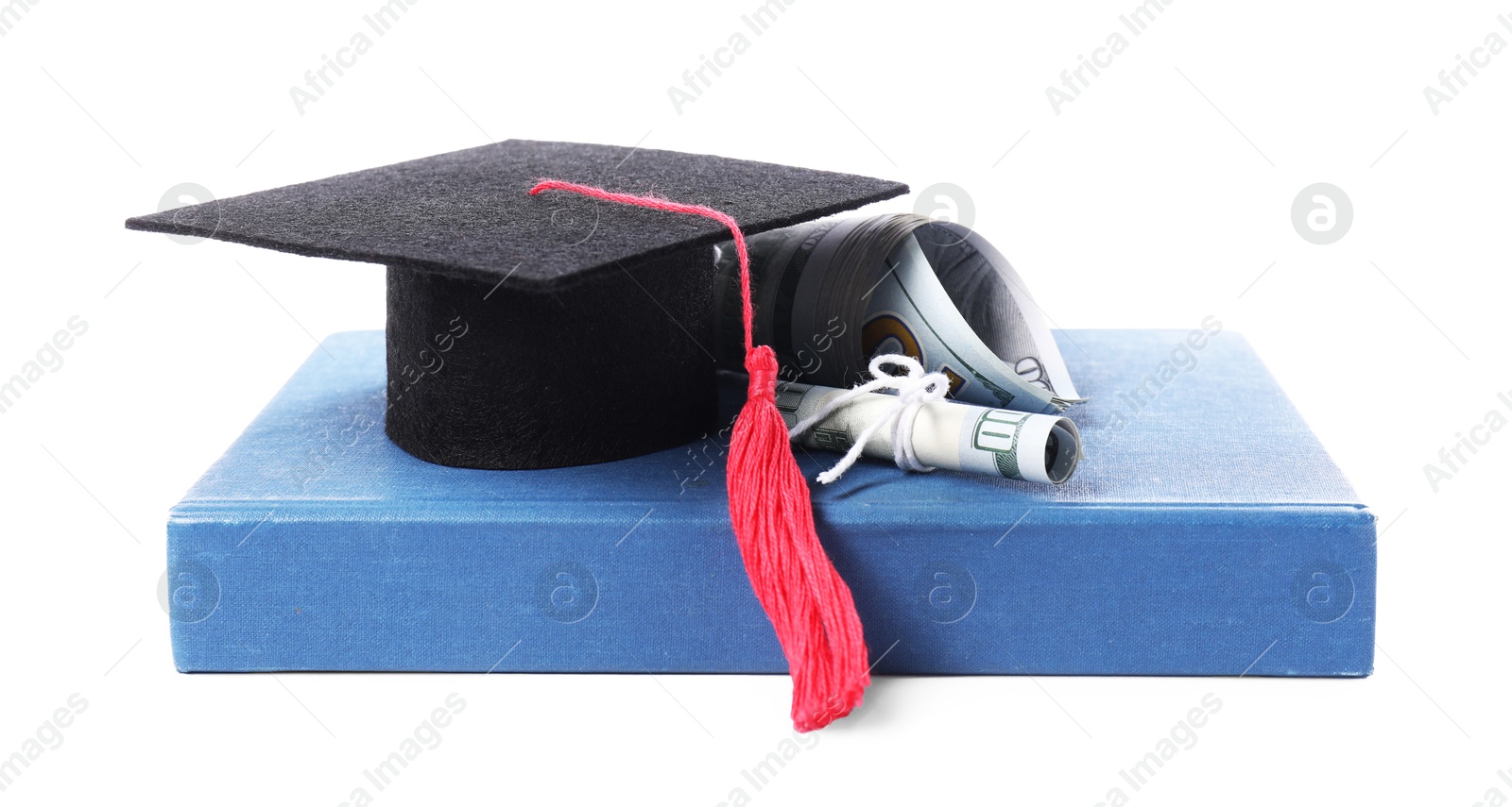 Photo of Graduate hat, dollar banknotes and book isolated on white. Tuition payment