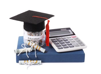 Photo of Graduate hat, dollar banknotes, calculator, book and glass jar with word Education isolated on white. Tuition payment