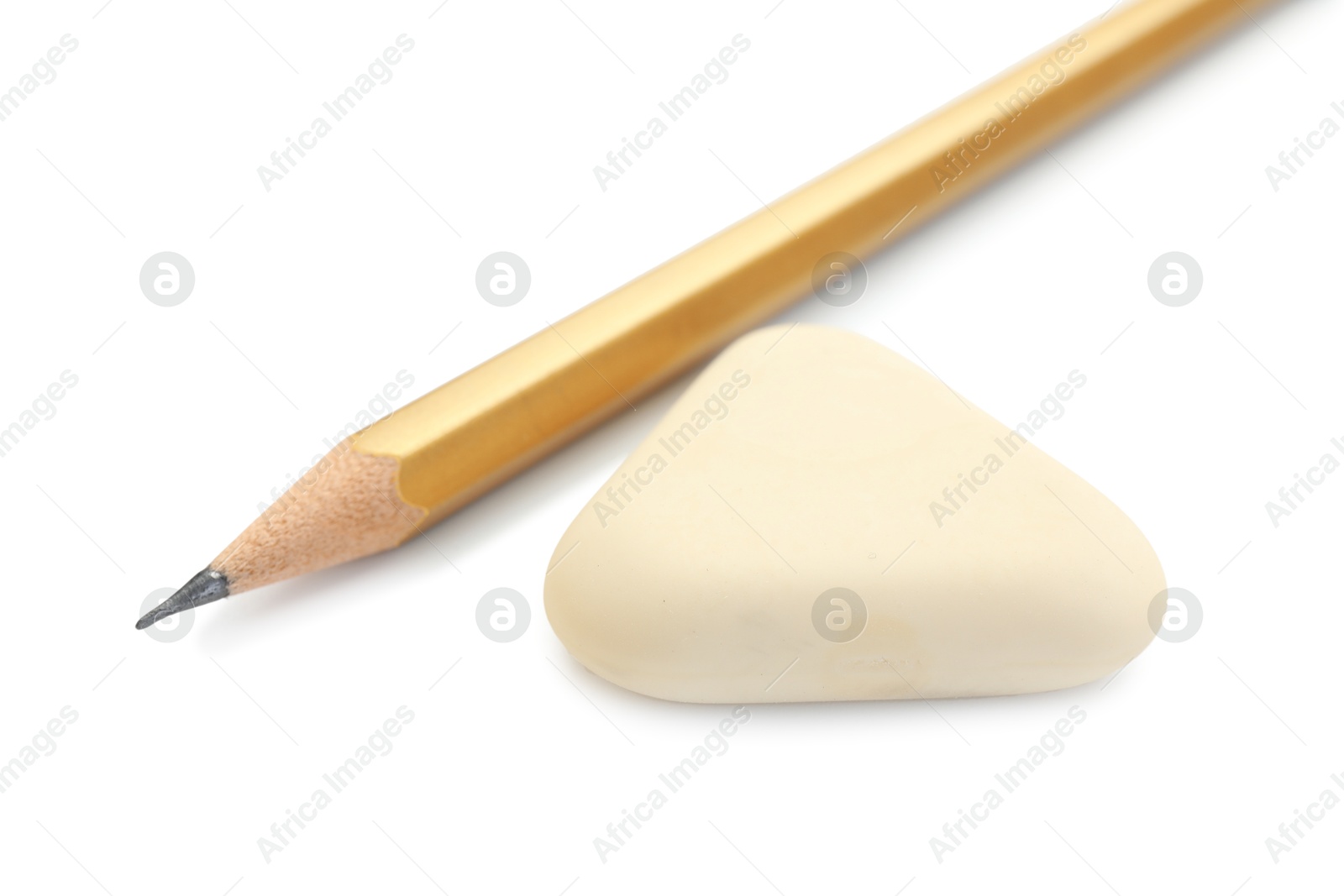 Photo of Eraser and pencil isolated on white. School stationery