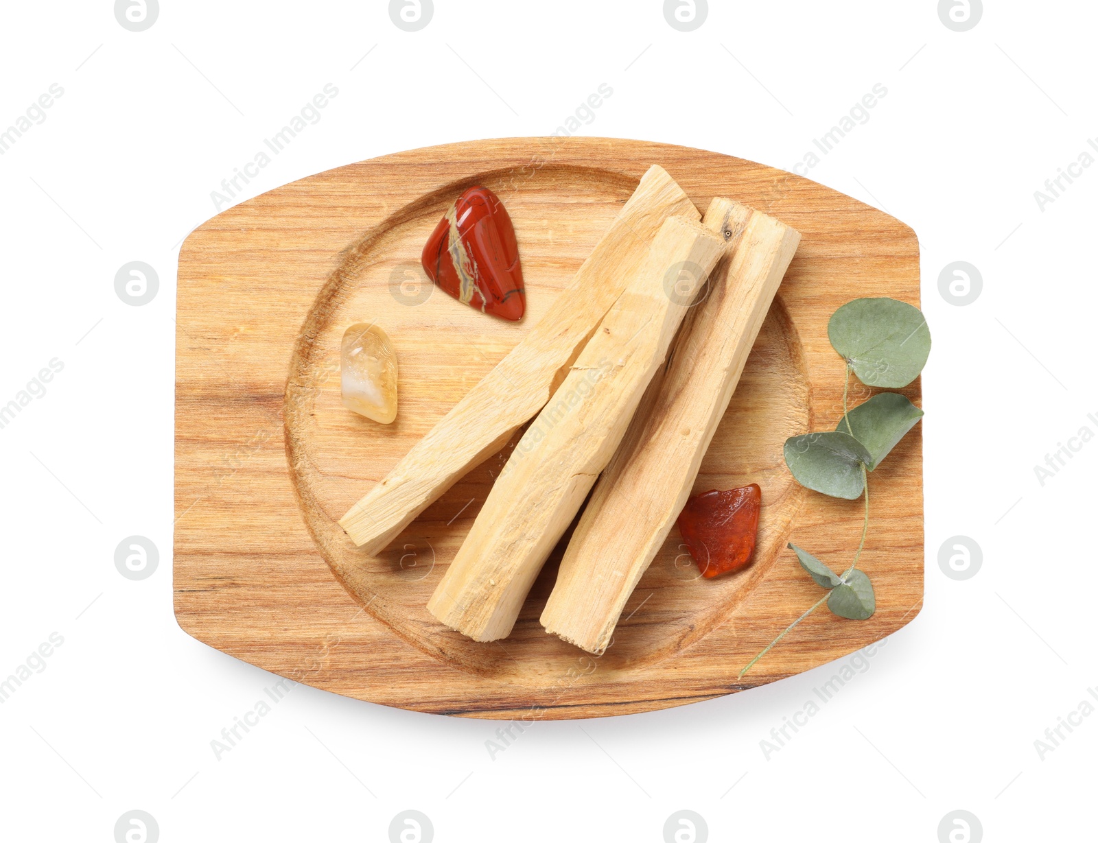 Photo of Palo santo sticks and gemstones isolated on white, top view