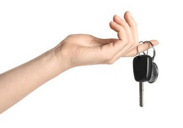 Photo of Woman with car key and keychain on white background, closeup