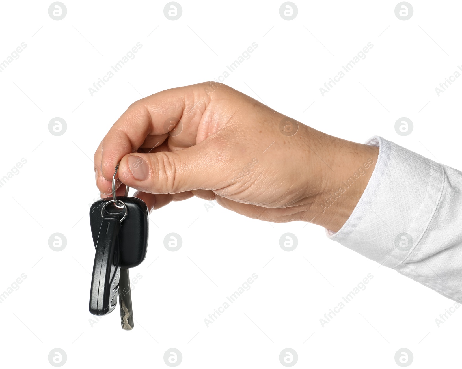 Man with car keys on white background, closeup Photo of Man with car keys on white background, closeup