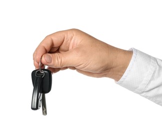 Photo of Man with car keys on white background, closeup