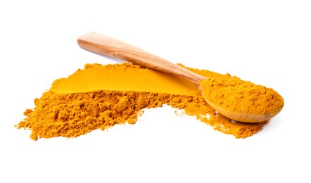 Photo of Turmeric powder and spoon isolated on white