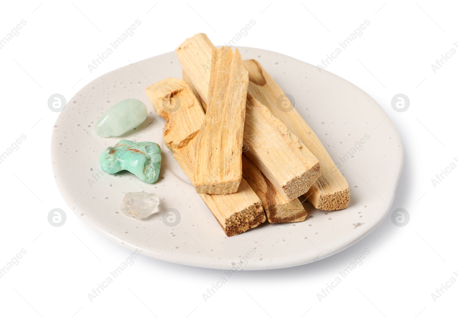 Photo of Palo santo sticks and gemstones isolated on white