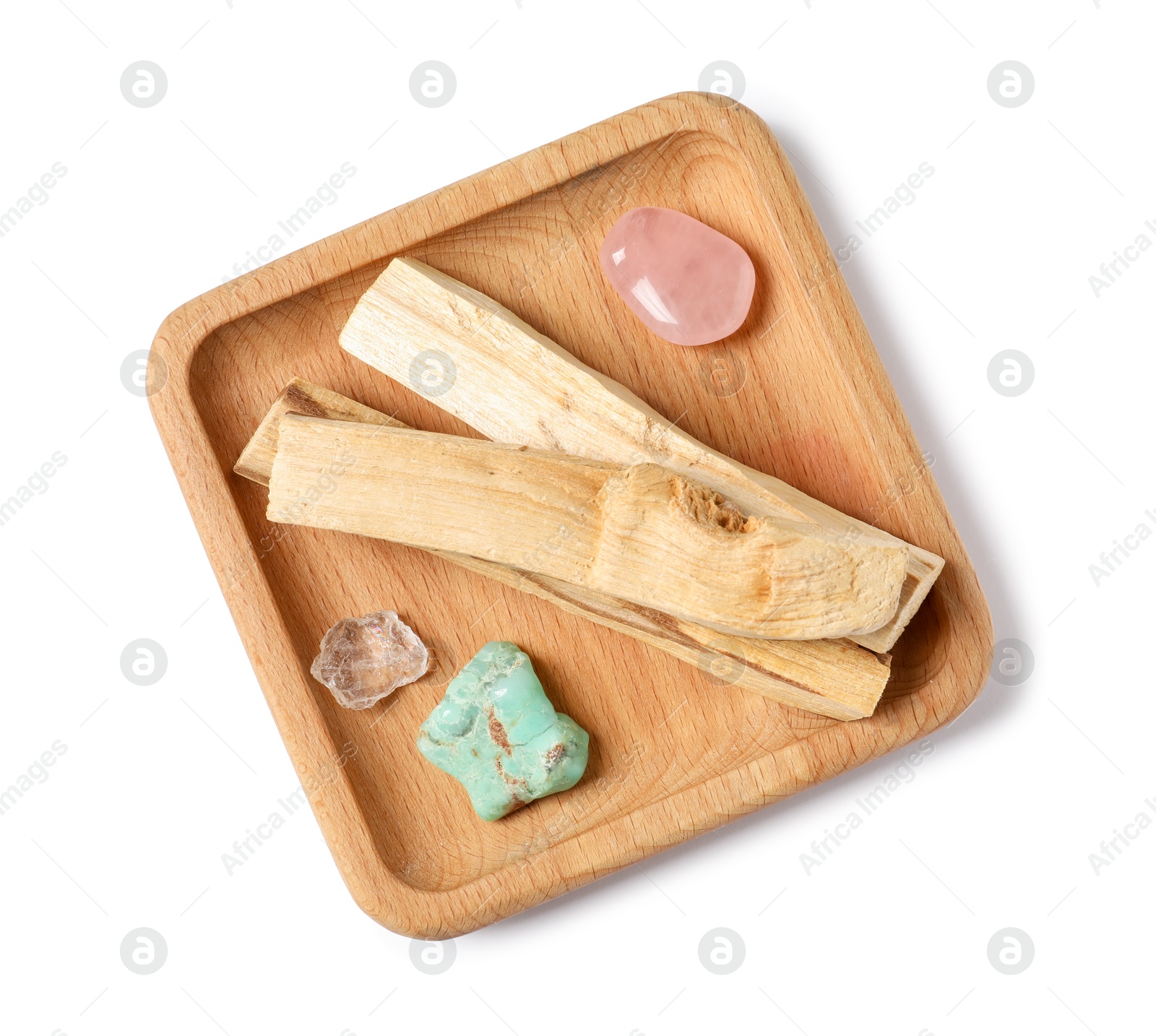 Photo of Palo santo sticks and gemstones isolated on white, top view