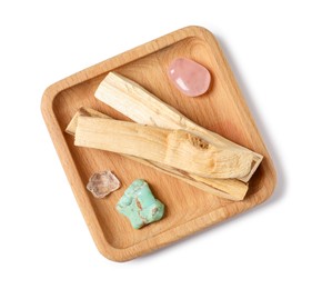 Photo of Palo santo sticks and gemstones isolated on white, top view