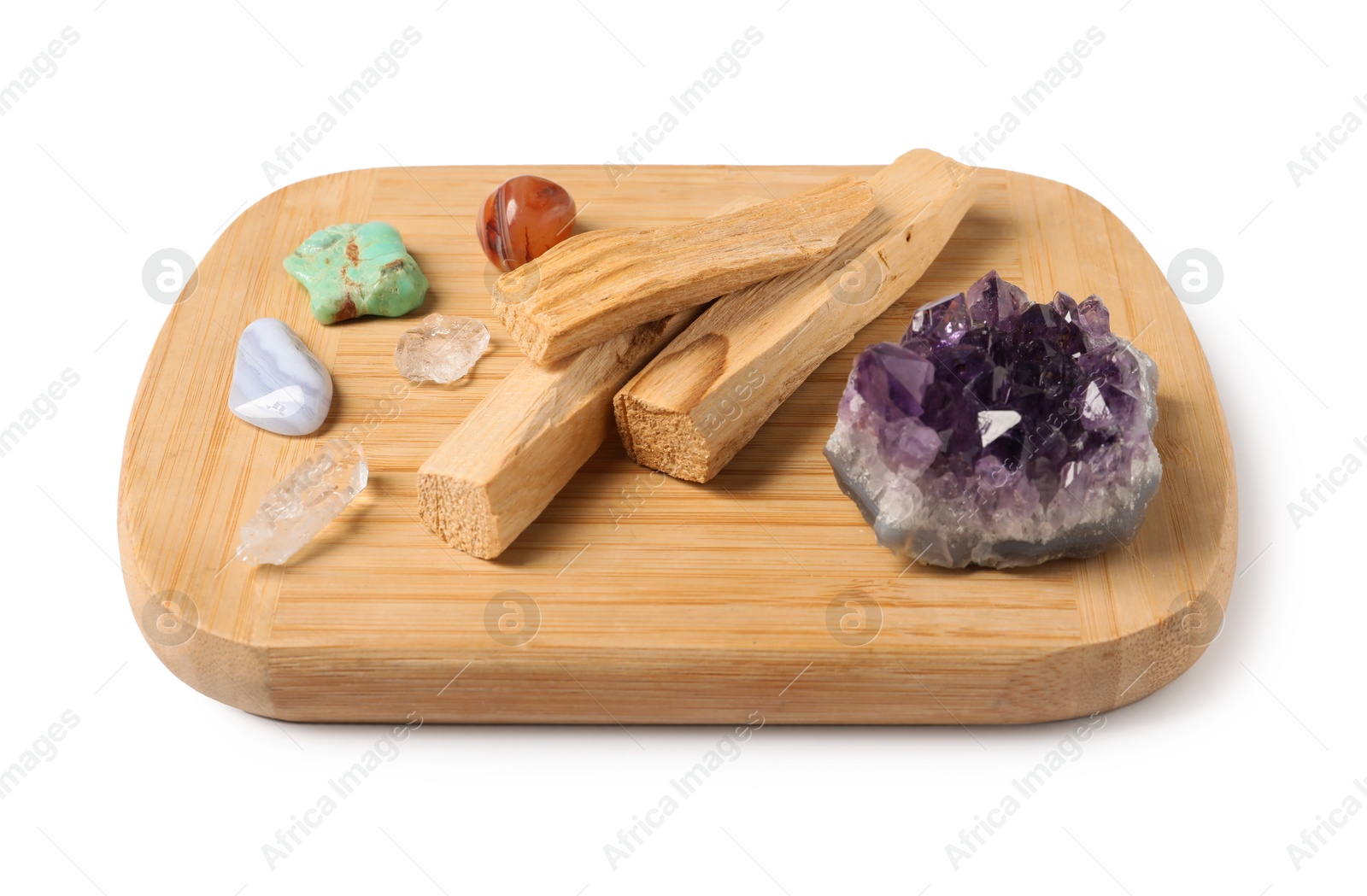 Photo of Palo santo sticks and gemstones isolated on white