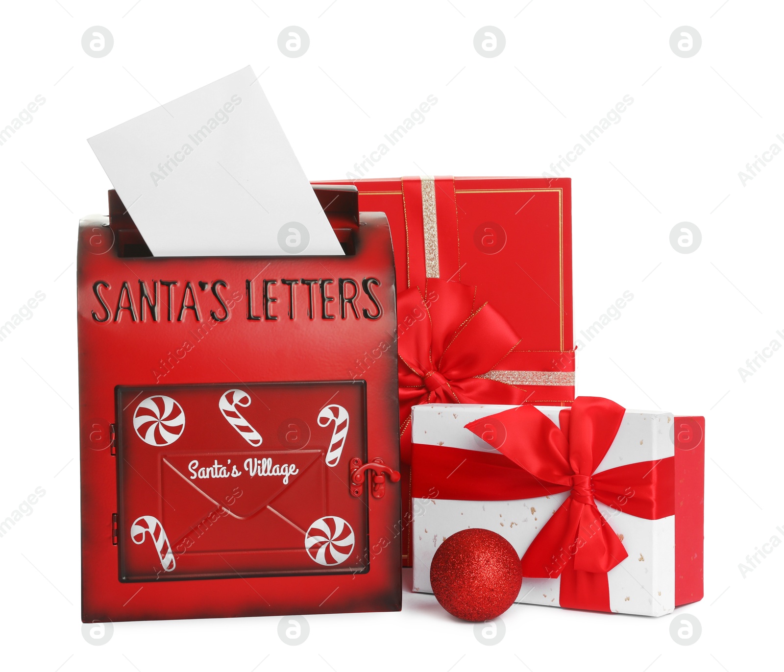 Photo of Santa Claus mail box with letter and gifts isolated on white. Christmas tradition