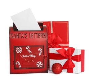 Photo of Santa Claus mail box with letter and gifts isolated on white. Christmas tradition