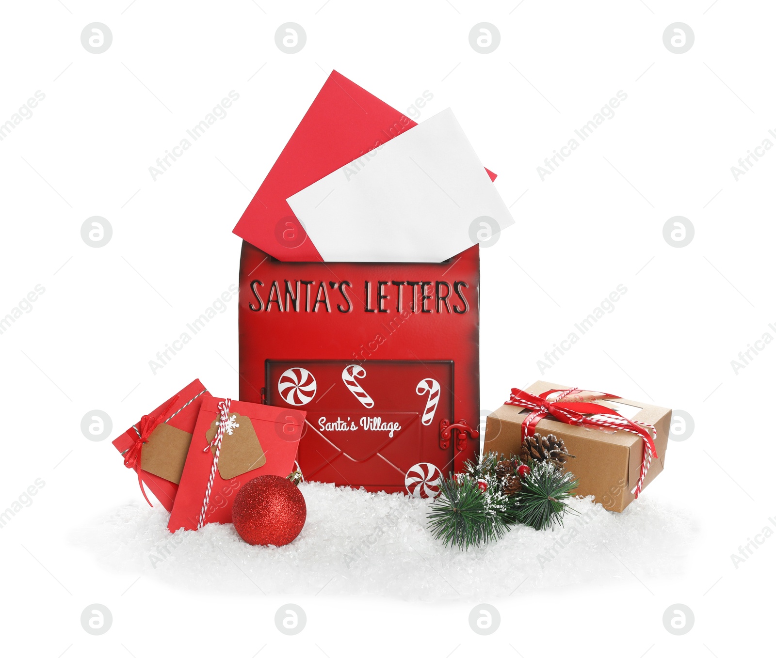 Photo of Santa Claus mail box with letters, gift, pine branch and artificial snow isolated on white. Christmas tradition