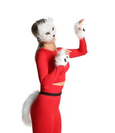 Photo of Quadrobics. Woman wearing cat mask, gloves and tail on white background