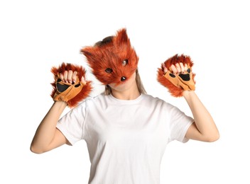 Photo of Quadrobics. Woman wearing fox mask and gloves on white background