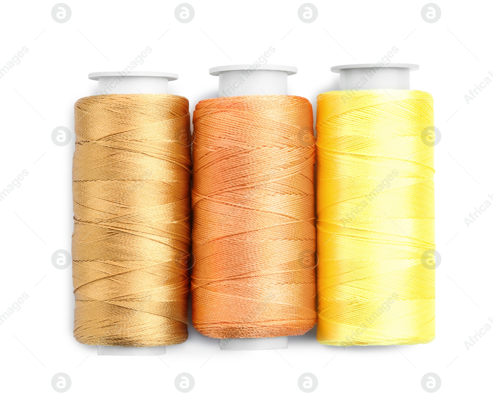 Photo of Spools of bright sewing threads isolated on white, top view