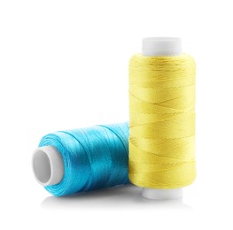 Photo of Spools of bright sewing threads isolated on white