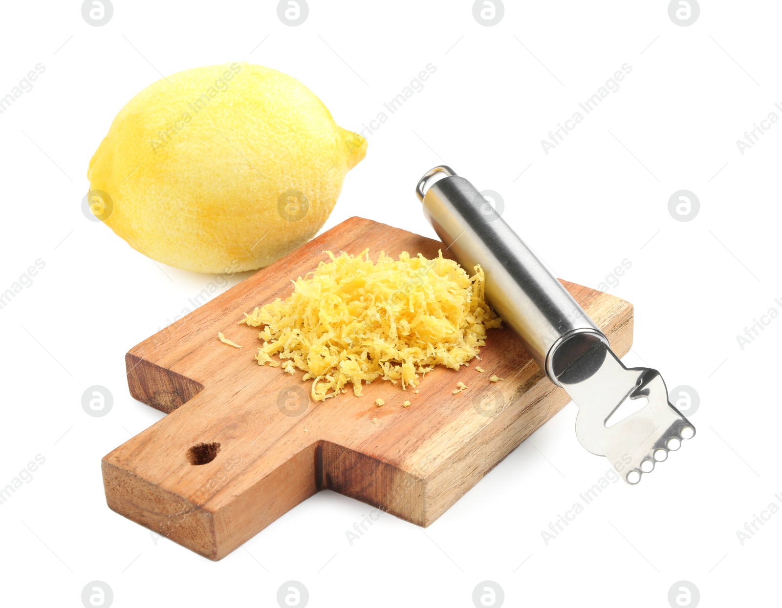 Photo of Lemon zest, fresh fruit and zester tool isolated on white