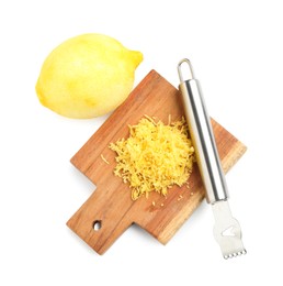 Photo of Lemon zest, fresh fruit and zester tool isolated on white, top view