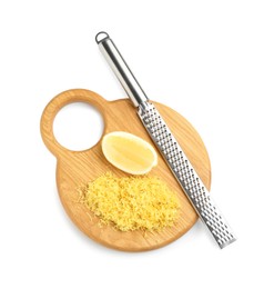 Photo of Lemon zest, piece of fresh fruit and grater isolated on white, top view