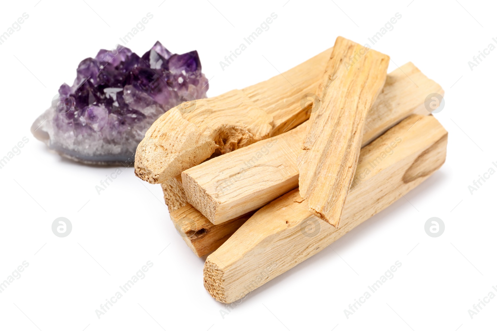 Photo of Palo santo sticks and gemstone isolated on white