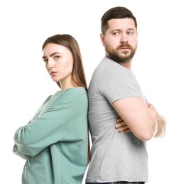 Photo of Resentful couple with crossed arms on white background