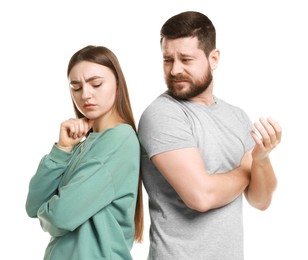 Photo of Resentful couple on white background. Relationship problem