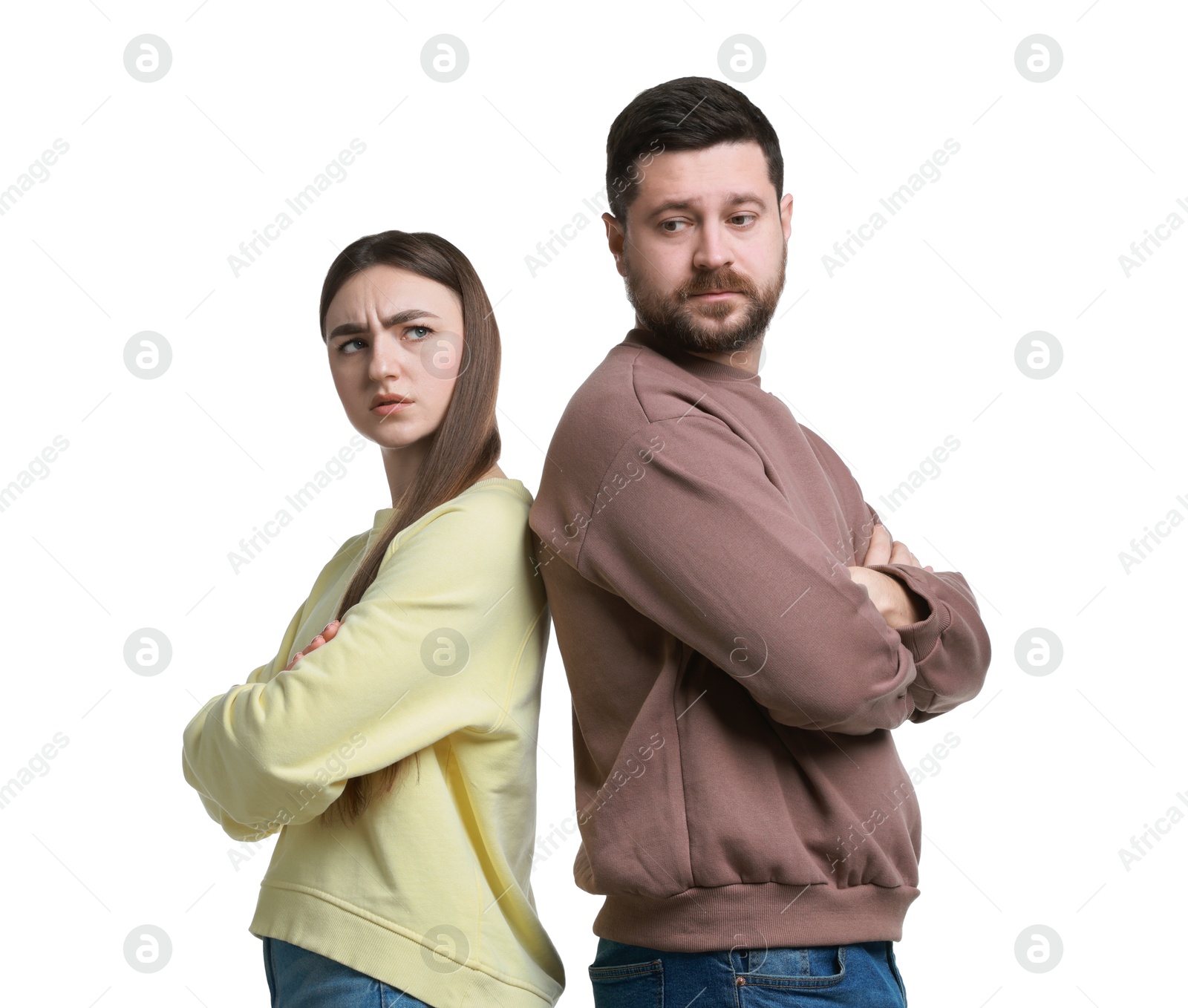 Photo of Resentful couple with crossed arms on white background