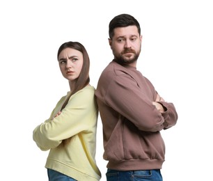 Photo of Resentful couple with crossed arms on white background