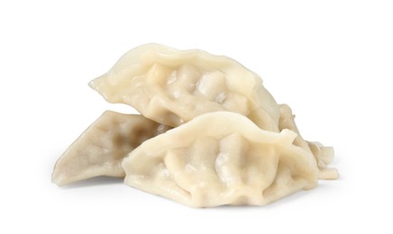 Photo of Tasty boiled gyoza (dumplings) isolated on white