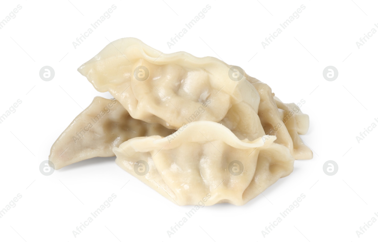 Photo of Tasty boiled gyoza (dumplings) isolated on white