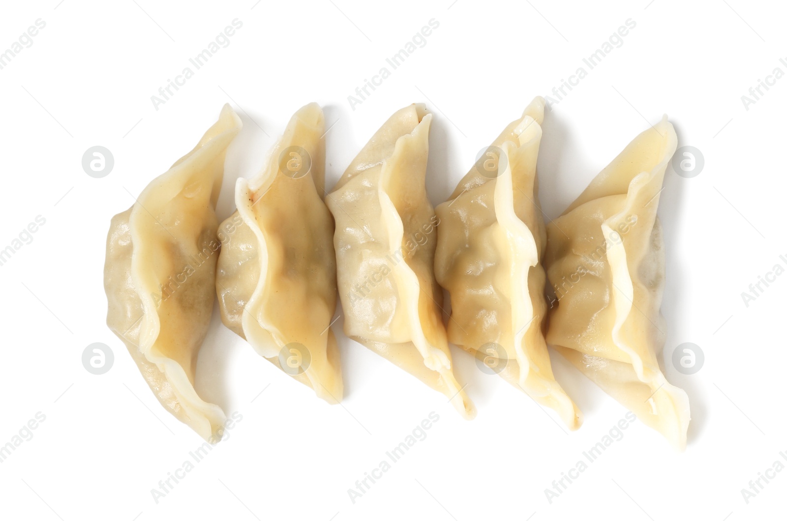 Photo of Tasty boiled gyoza (dumplings) isolated on white, top view