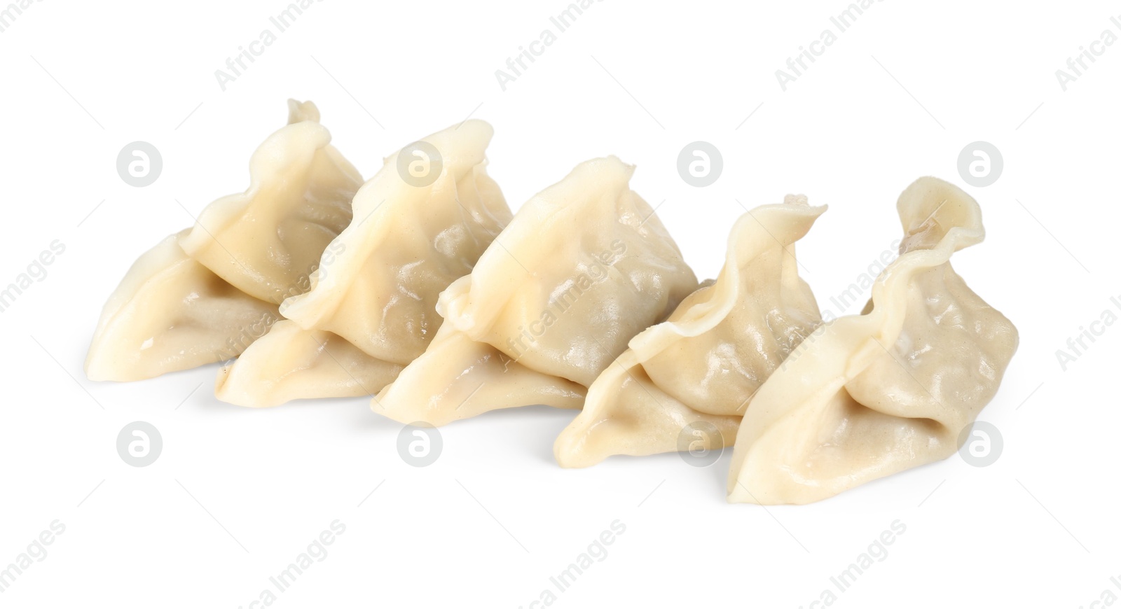 Photo of Tasty boiled gyoza (dumplings) isolated on white