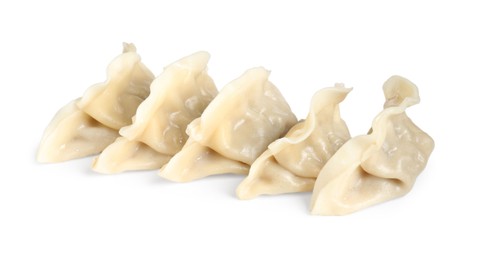 Photo of Tasty boiled gyoza (dumplings) isolated on white