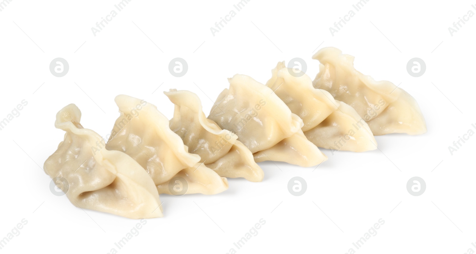 Photo of Tasty boiled gyoza (dumplings) isolated on white