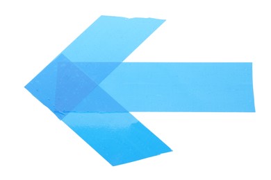 Photo of Arrow made of light blue adhesive tape on white background, top view