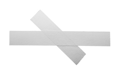 Photo of Cross made of silver adhesive tape on white background, top view