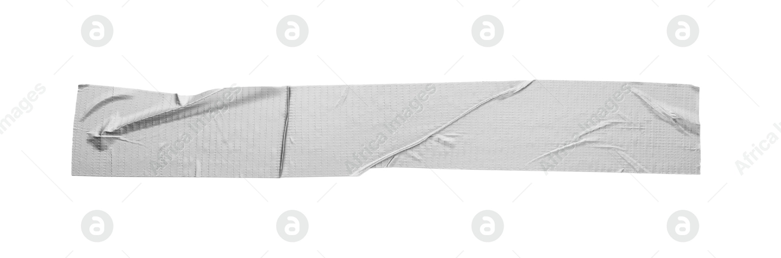 Photo of Strip of silver adhesive tape on white background, top view