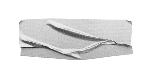 Photo of Wrinkled strip of silver adhesive tape on white background, top view