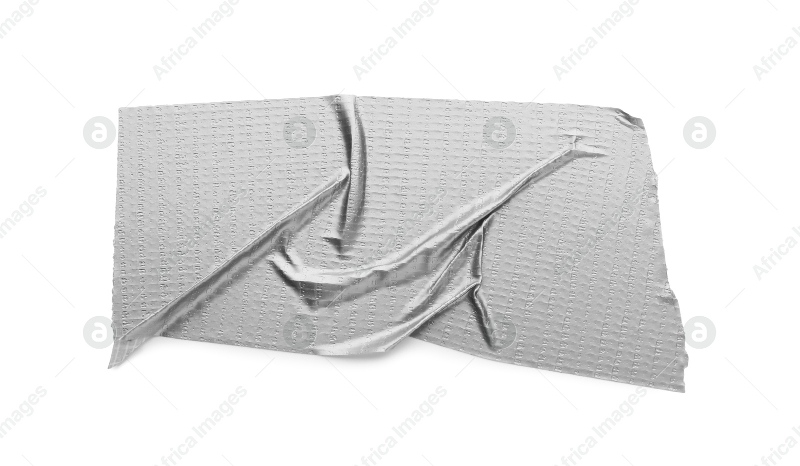 Photo of Wrinkled strip of silver adhesive tape on white background, top view