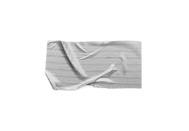 Photo of Strip of silver adhesive tape on white background, top view