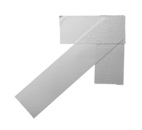 Photo of Arrow made of silver adhesive tape on white background, top view