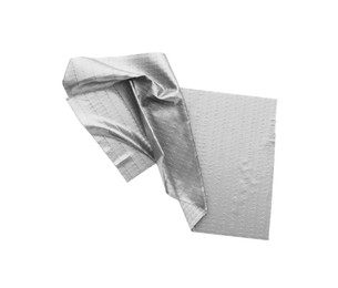 Photo of Strip of silver adhesive tape on white background, top view