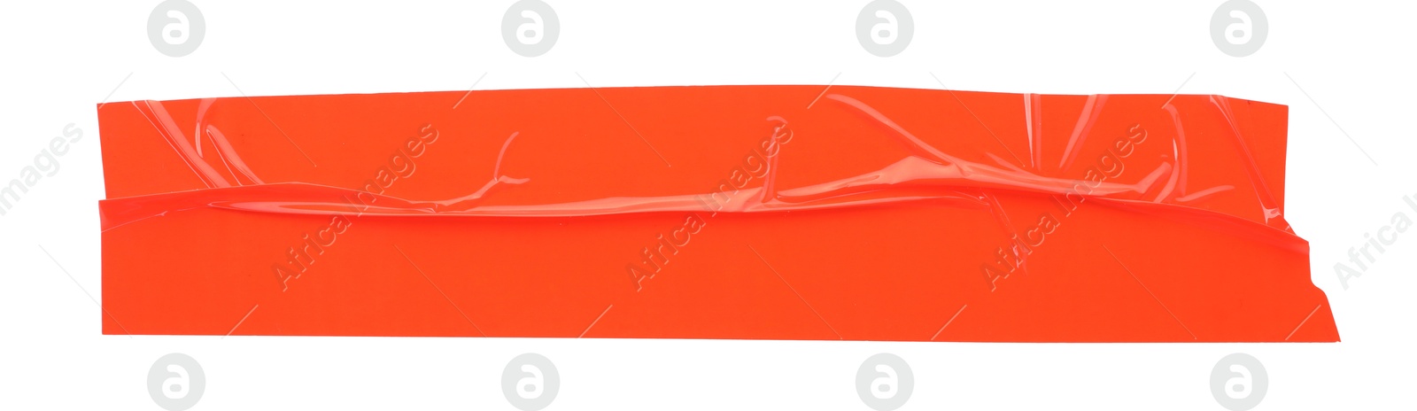 Photo of Strip of red adhesive tape on white background, top view