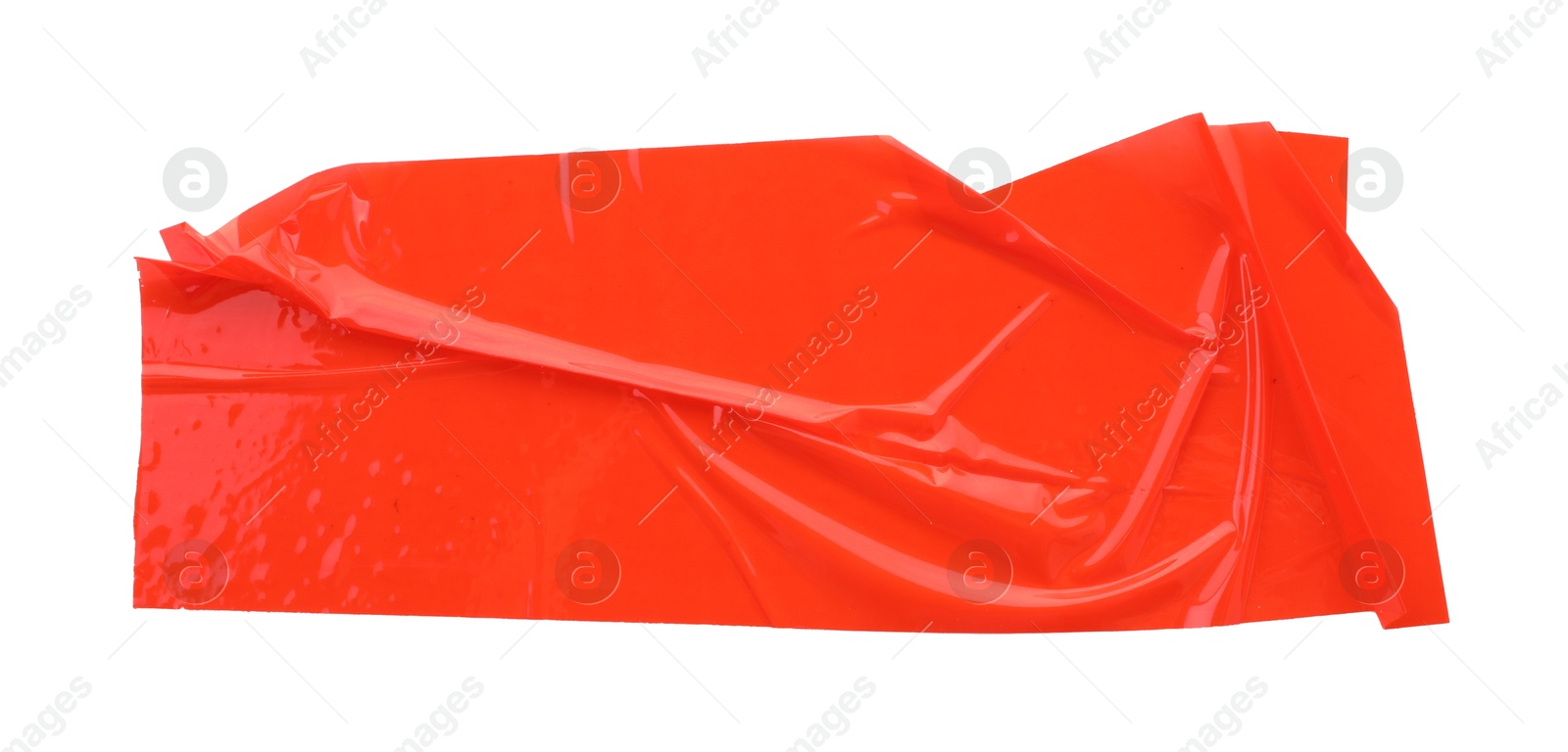 Photo of Strip of red adhesive tape on white background, top view