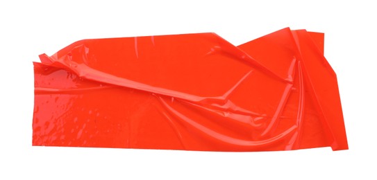 Photo of Strip of red adhesive tape on white background, top view