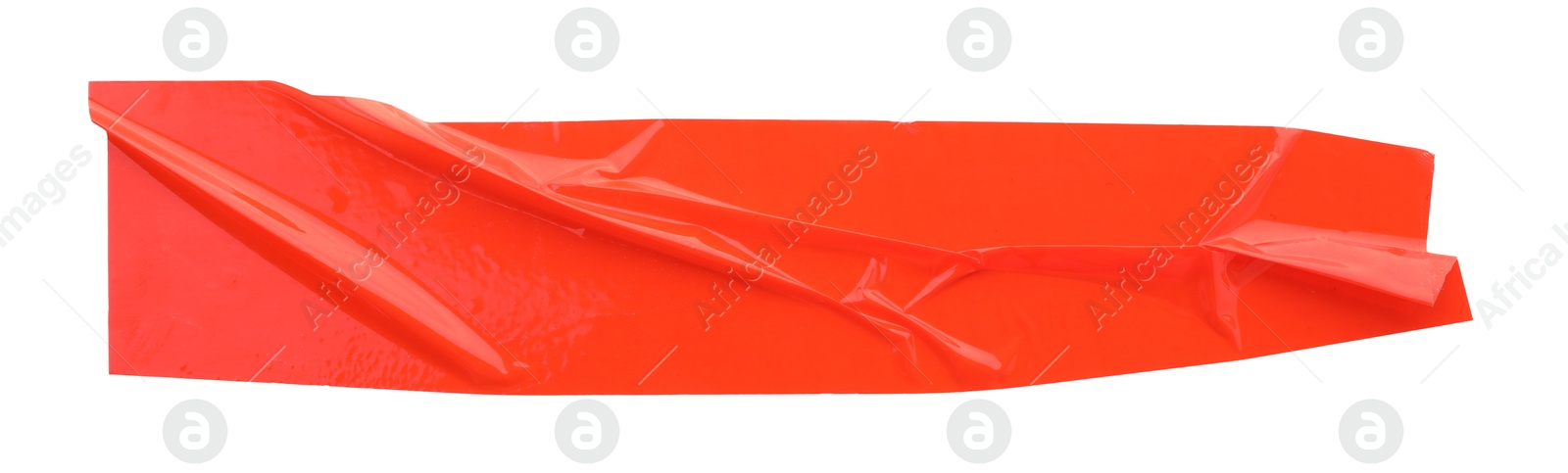 Photo of Strip of red adhesive tape on white background, top view