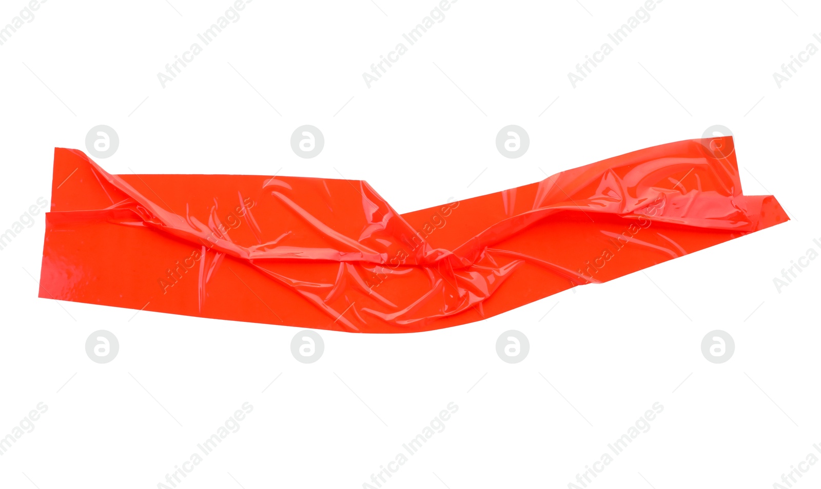 Photo of Strip of red adhesive tape on white background, top view